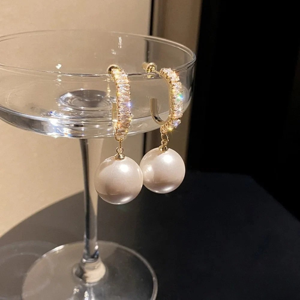 Elegante oorbellen met parels en zirkonia