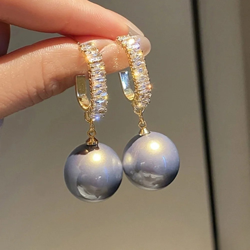 Elegante oorbellen met parels en zirkonia