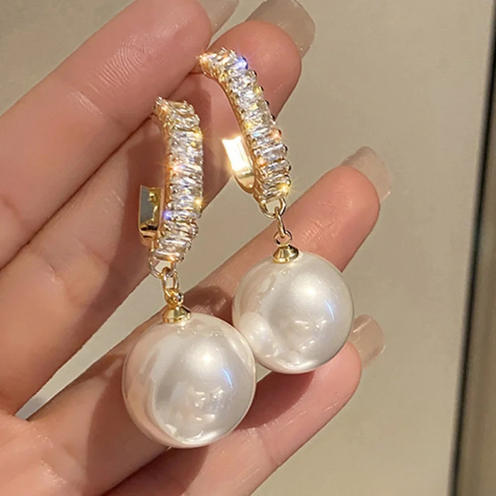 Elegante oorbellen met parels en zirkonia